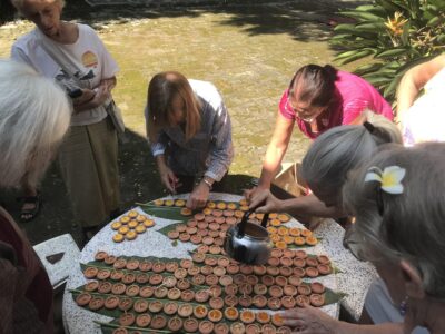 Lifelong Learning Payap Yee Peng Lanna Lantern Festival lighting the tea light candles
