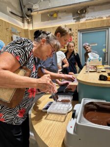 Creating their own chocolate bars at the Bean to Bar event