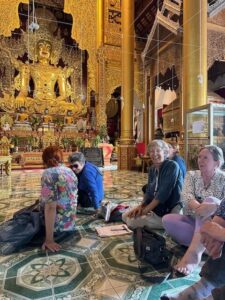 Shan History and Culture group kneeling in temple