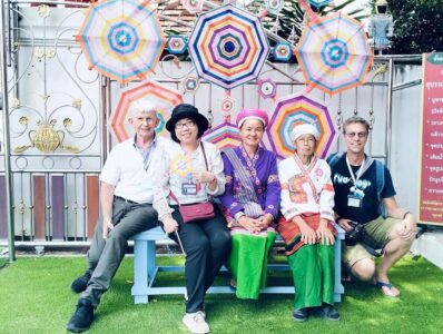 Excursion to Tai Khuen, Tai Yong, and Tai Lue Communities sat on bench