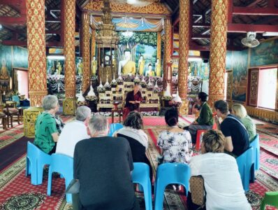 Excursion to Tai Khuen, Tai Yong, and Tai Lue Communities atendees in temple