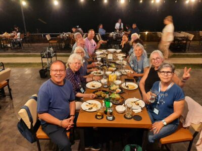 Savor a delicious local feast with friends at a lakeside restaurant in Phayao.