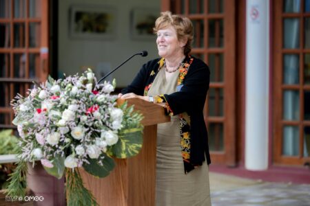 U.S. Consul General Kelia Cummins delivers remarks introducing Ambassador Eric Rubin and Nicole Simmons at the mural dedication ceremony.