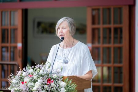 Christine Tananone delivers remarks of gratitude on behalf of Lifelong Learning Payap at the conclusion of the dedication ceremony.