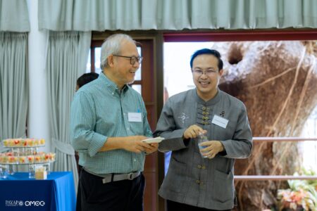 Ajarn Richie Chen and President Apicha Insuwan share a conversation during the Mural Dedication Ceremony at Payap University’s Lifelong Learning Center on 22 June 2026.
