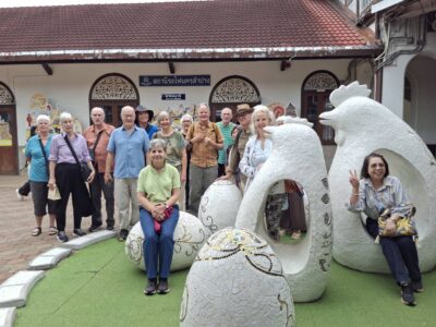The group gathers for a memorable photo at Lampang Railway Station, kicking off their exploration of the city's rich commercial heritage.